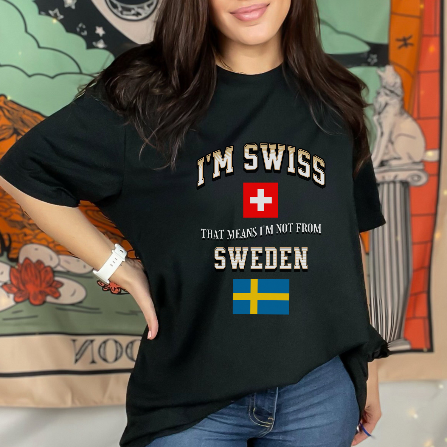 Image showing various apparel and accessories from the Swiss-Swedish Identity Collection, featuring the Swiss and Swedish flags with playful country name swaps