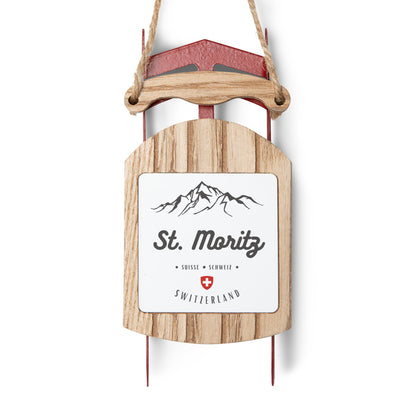 Rustic wooden sled ornament with St. Moritz text for Swiss-themed decor