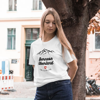 Nature-inspired travel t-shirt featuring Bernese Oberland mountains and Swiss pride