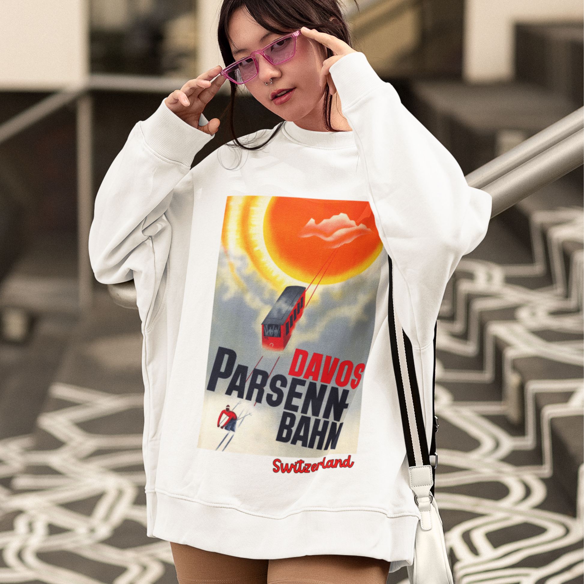 Vintage travel poster sweatshirt featuring Davos- Parsenn Bahn railway and skier silhouette.