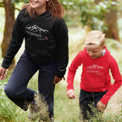 Kids pullover hoodie featuring the enchanting beauty of Lauterbrunnen – a perfect souvenir from Switzerland