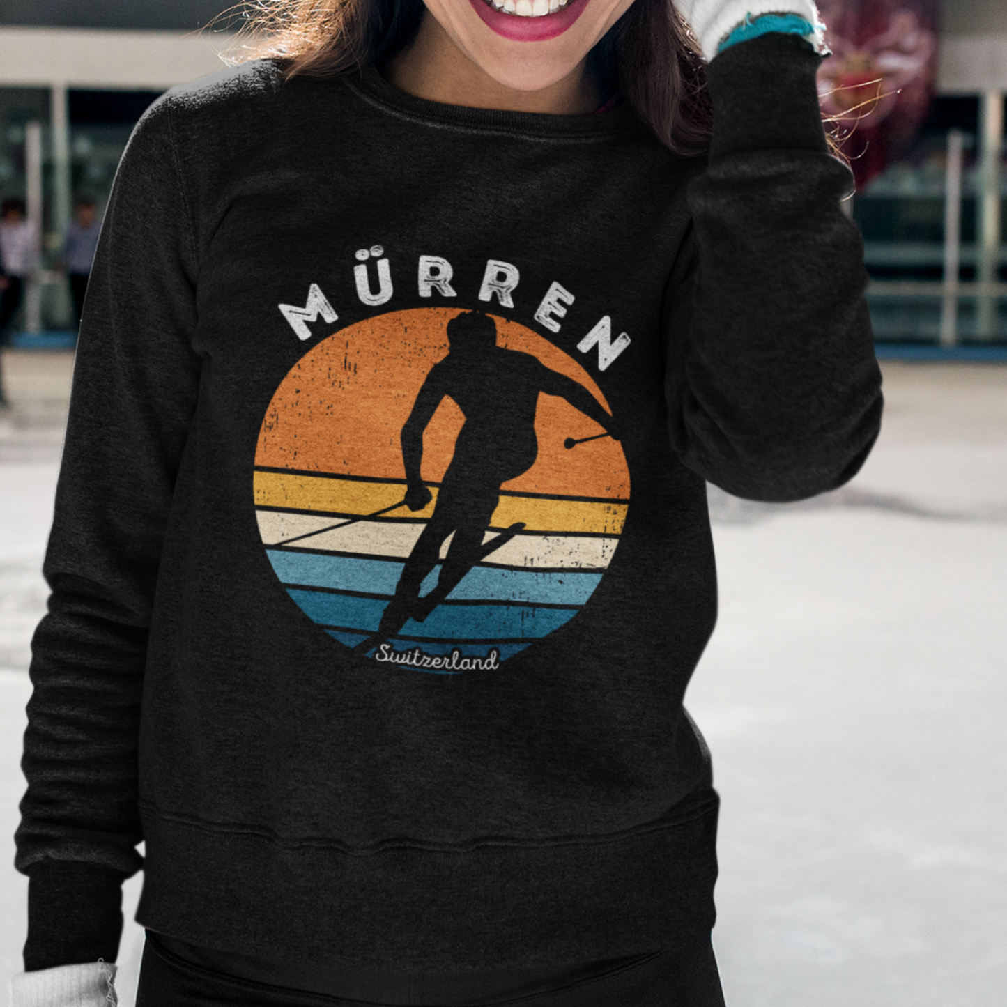 A ski enthusiast wearing the vintage-inspired sweatshirt, evoking the spirit of Mürren