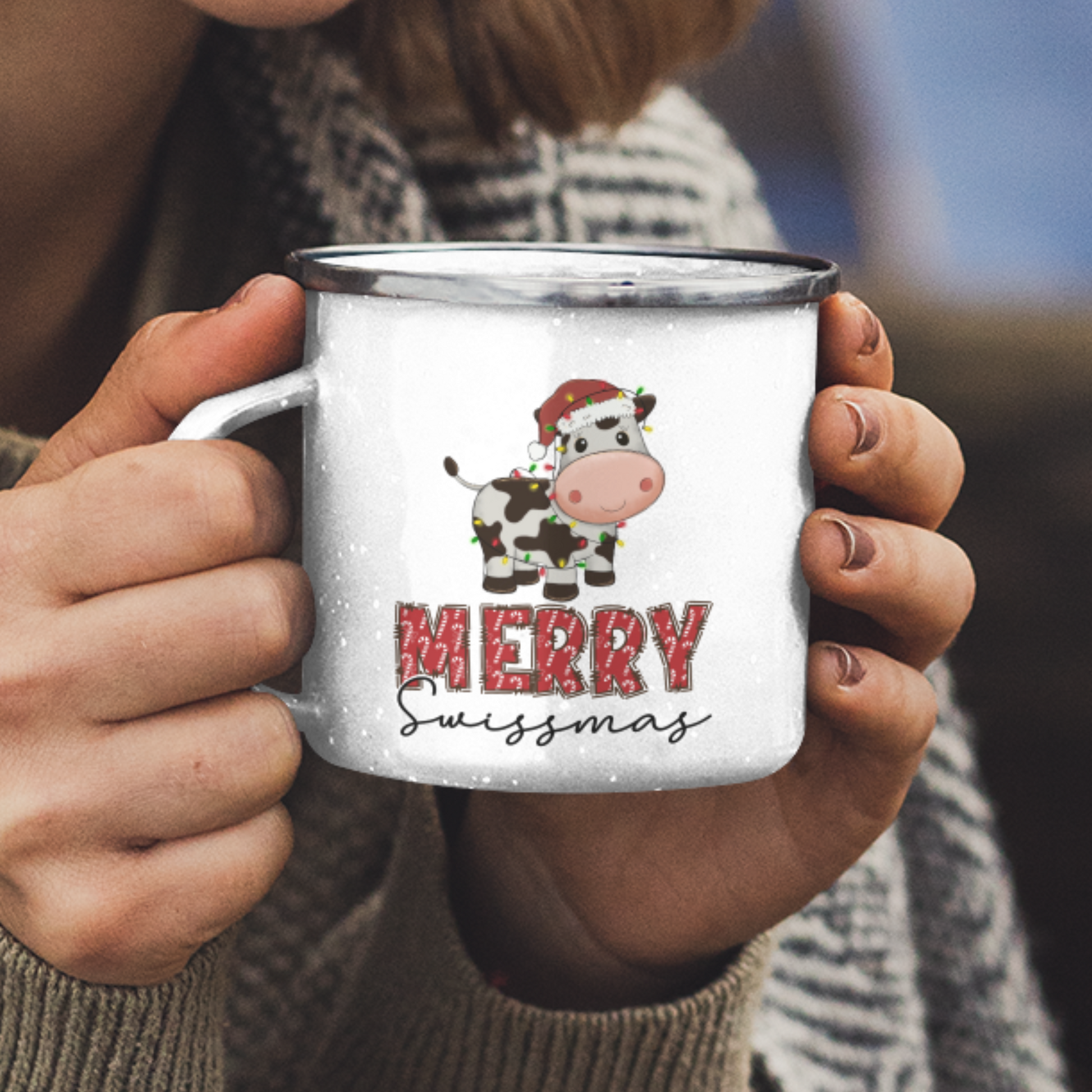 Merry Swissmas Camping Mug featuring an adorable Swiss Christmas cow with a Santa hat, ringing a cow bell in the snowy Swiss Alps. Perfect for adding holiday charm to your camping adventures or festive moments at home