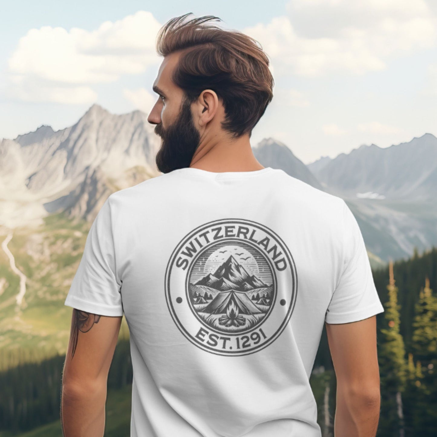 Back view of a white t-shirt with a circular Swiss mountain badge design, marked with "Switzerland EST. 1291