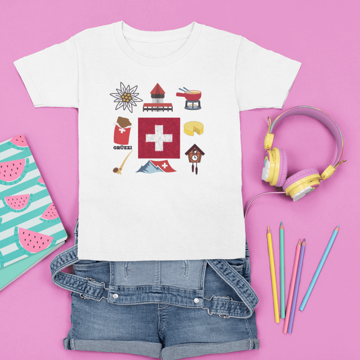 Girl wearing Swiss travel-themed t-shirt featuring iconic landmarks and a sense of adventure.