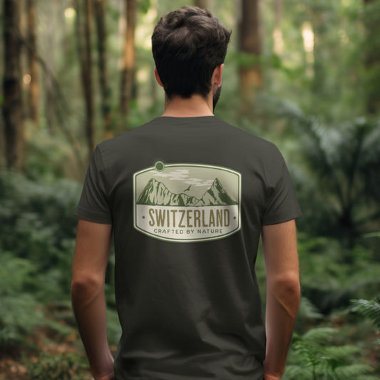 Olive Green pocket tee with mountain and forest design, celebrating Switzerland's natural beauty. back of tee