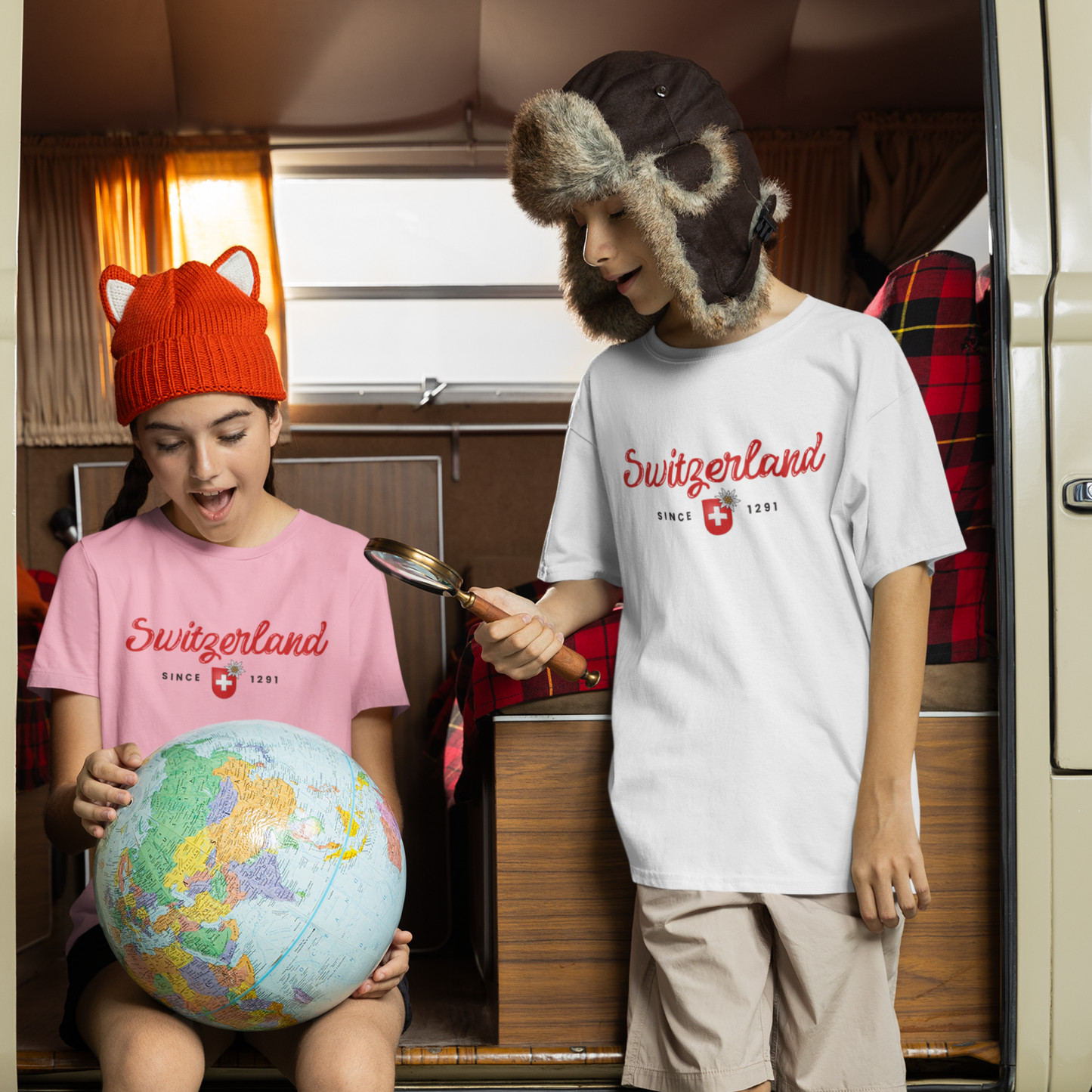 Switzerland - Since 1291 organic kids T-shirt with Swiss coat of arms and edelweiss flower design. Available in white and pink