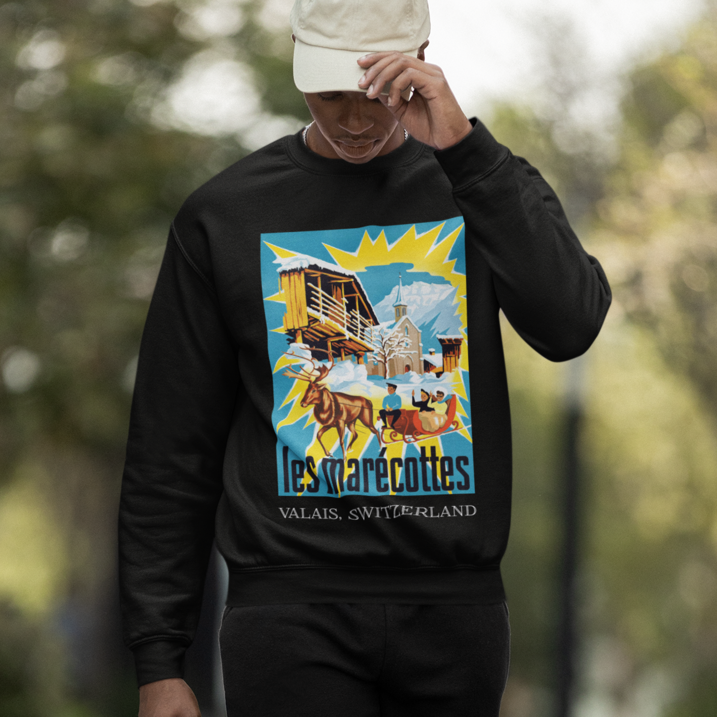 Les Marécottes, Switzerland Vintage Travel Sweatshirt featuring a retro illustration of a Valais chalet and church