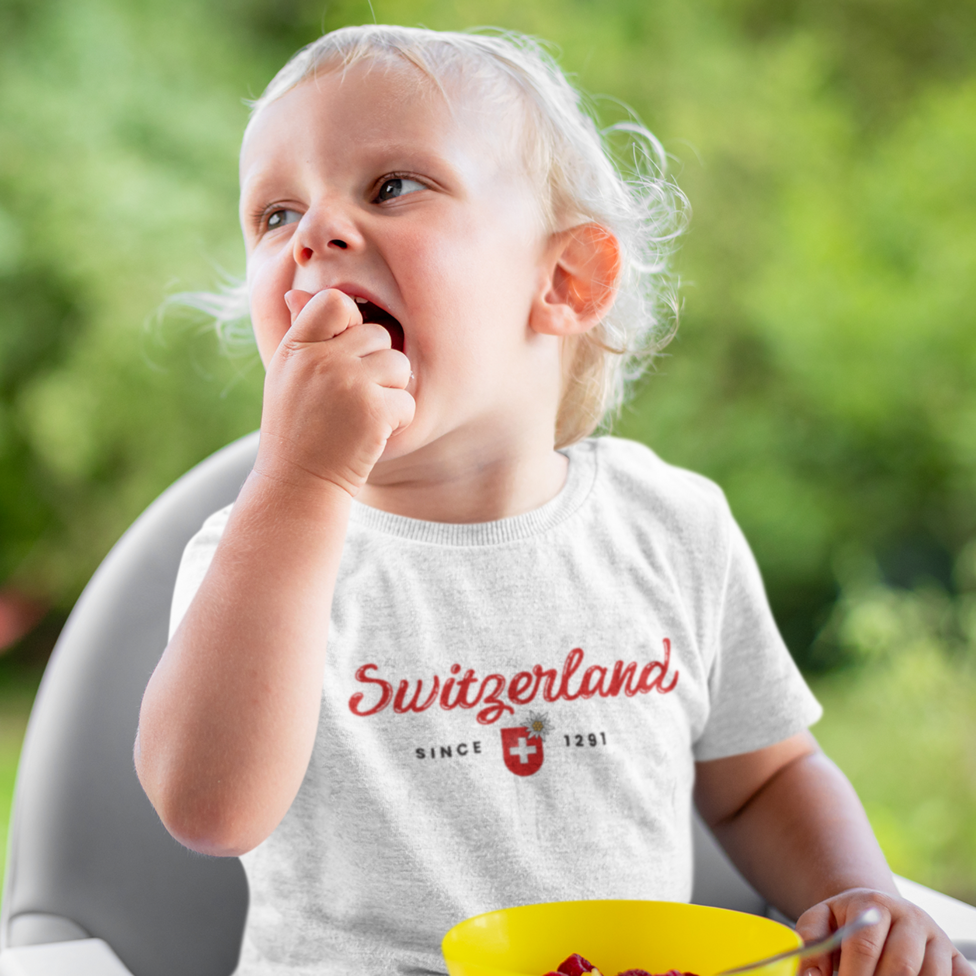 Premium Toddler T-shirt featuring Swiss coat of arms and Edelweiss flower. Crafted from Airlume cotton for ultimate comfort and style