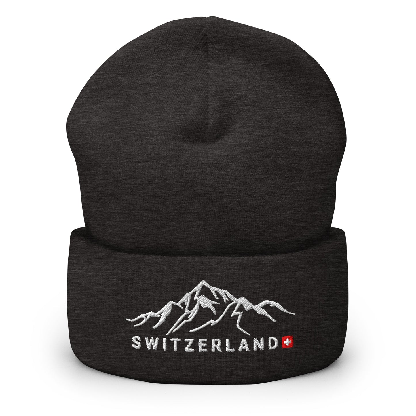 Close-up of black knit beanie featuring a detailed mountain embroidery and 'Switzerland' text