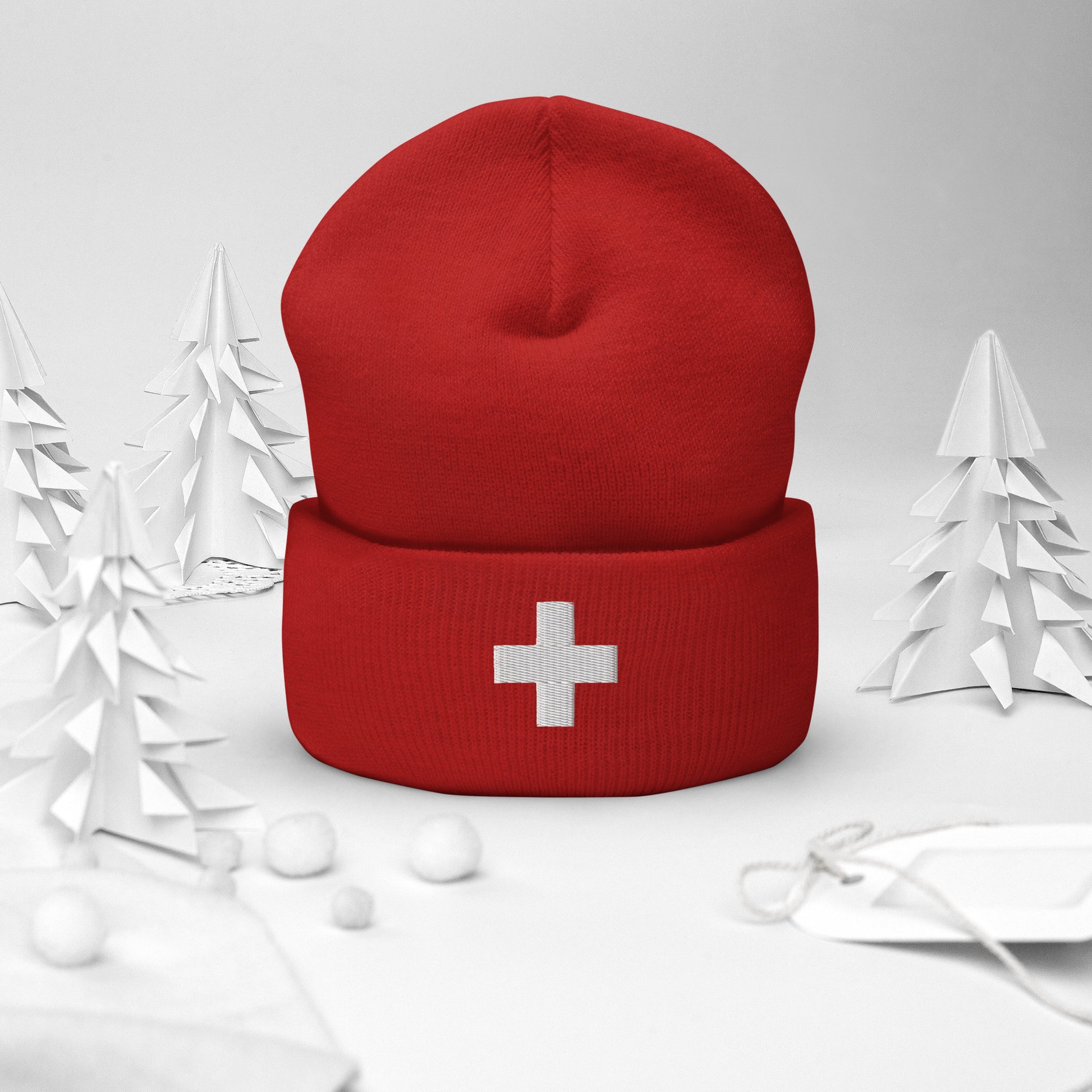 Cozy red knit beanie featuring high-quality Swiss cross embroidery 